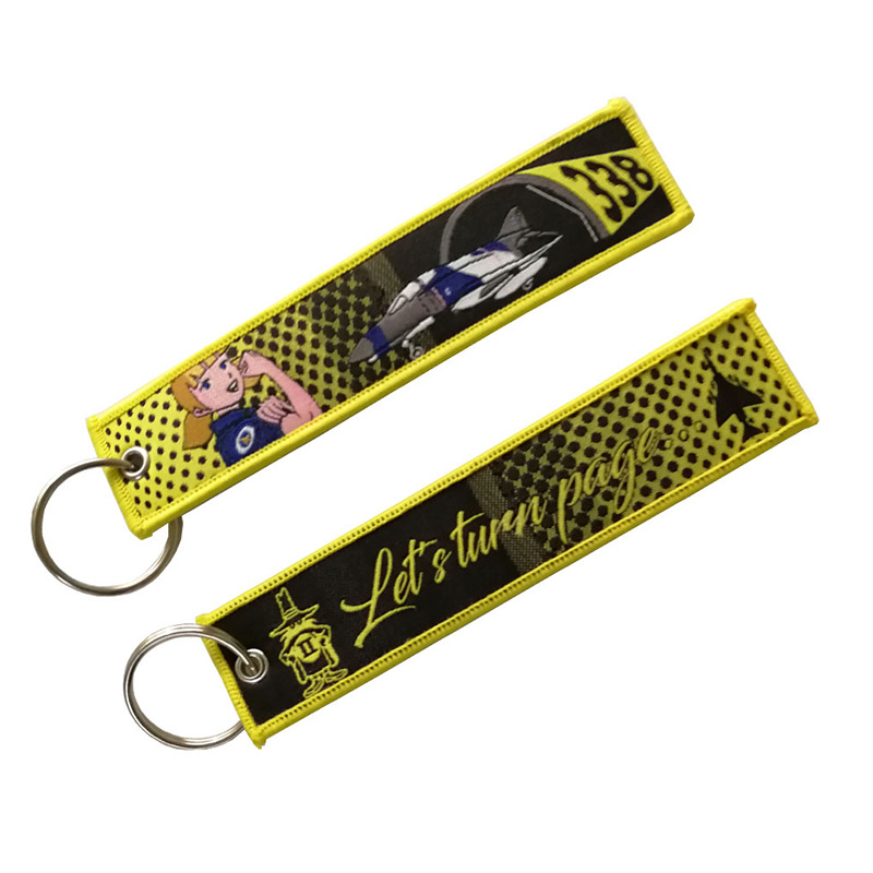 Let us turn page woven keychain  